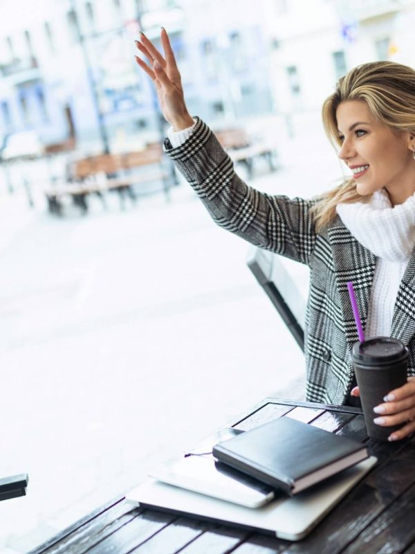 adult-female-hr-specialist-waiting-for-a-candidate-for-a-position-in-a-cafe-with-a-cup-of-coffee-and.jpg